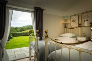 A romantic, country bedroom overlooking the garden